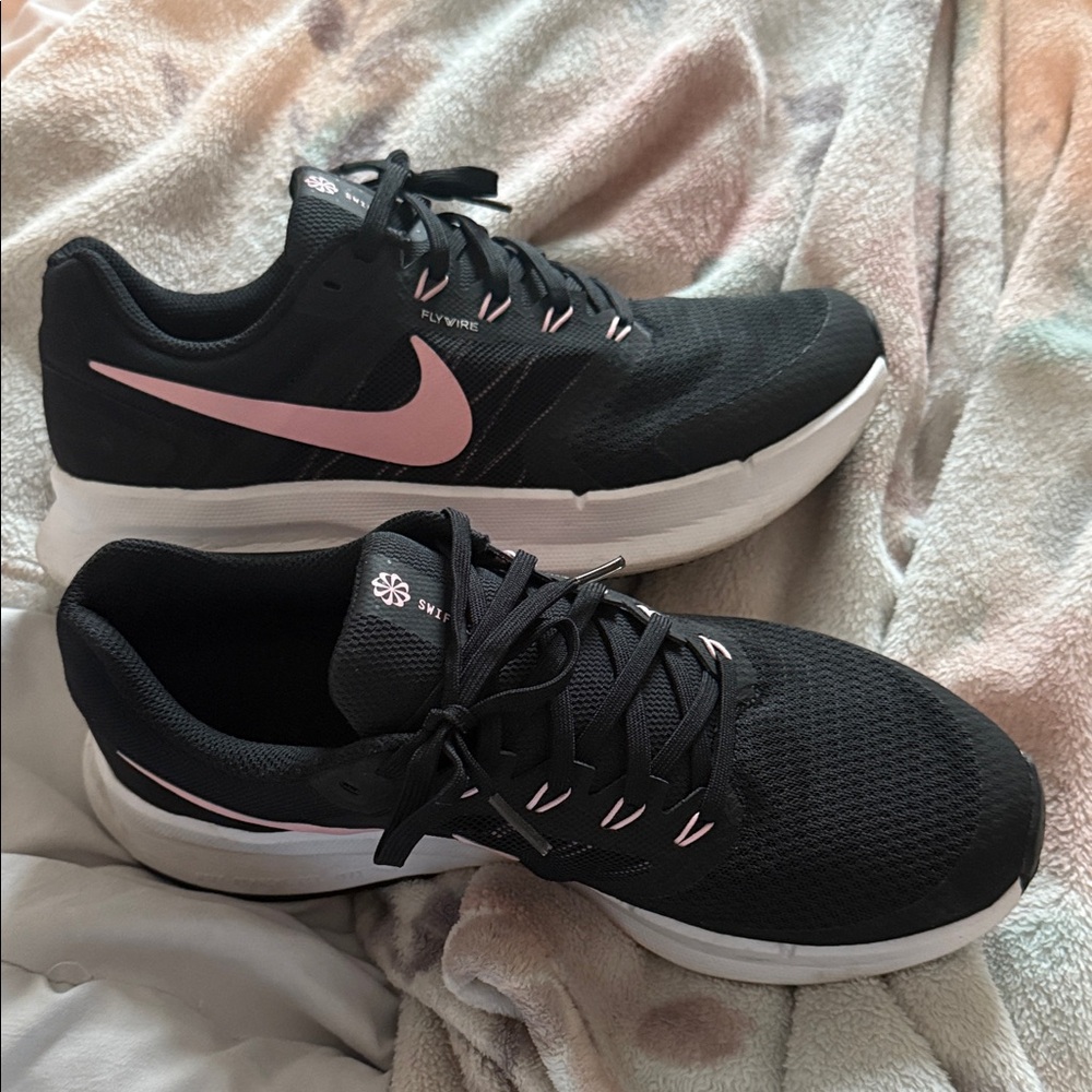 Nike Women's Black and Pink Flywire Sneakers